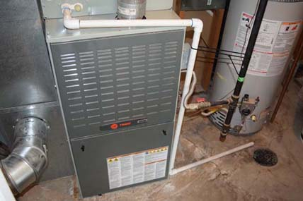 Condensate Drainpipe Discharges to Floor Drain